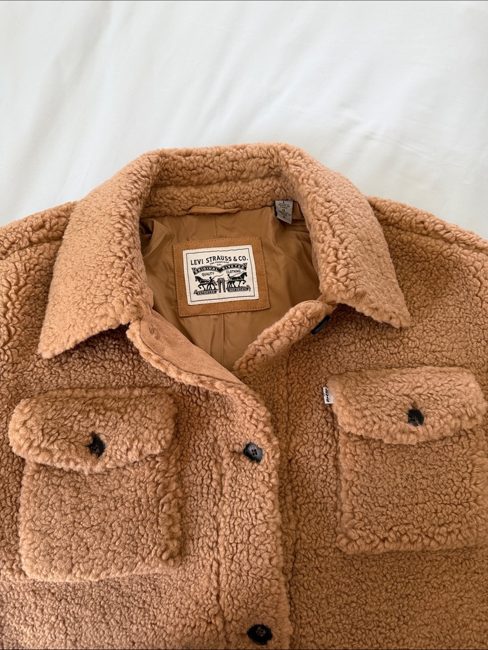 Levi's Women’s Camel/Tan Sherpa Button-Up Jacket with a laydown collar